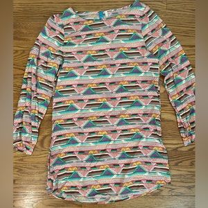 Never worn, really soft material, lots of fun colors.